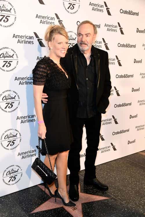 Katie McNeil (L) and recording artist Neil Diamond attend Capitol Records 75th Anniversary Gala at Capitol Records Tower on November 15, 2016 in Los Angeles, California.