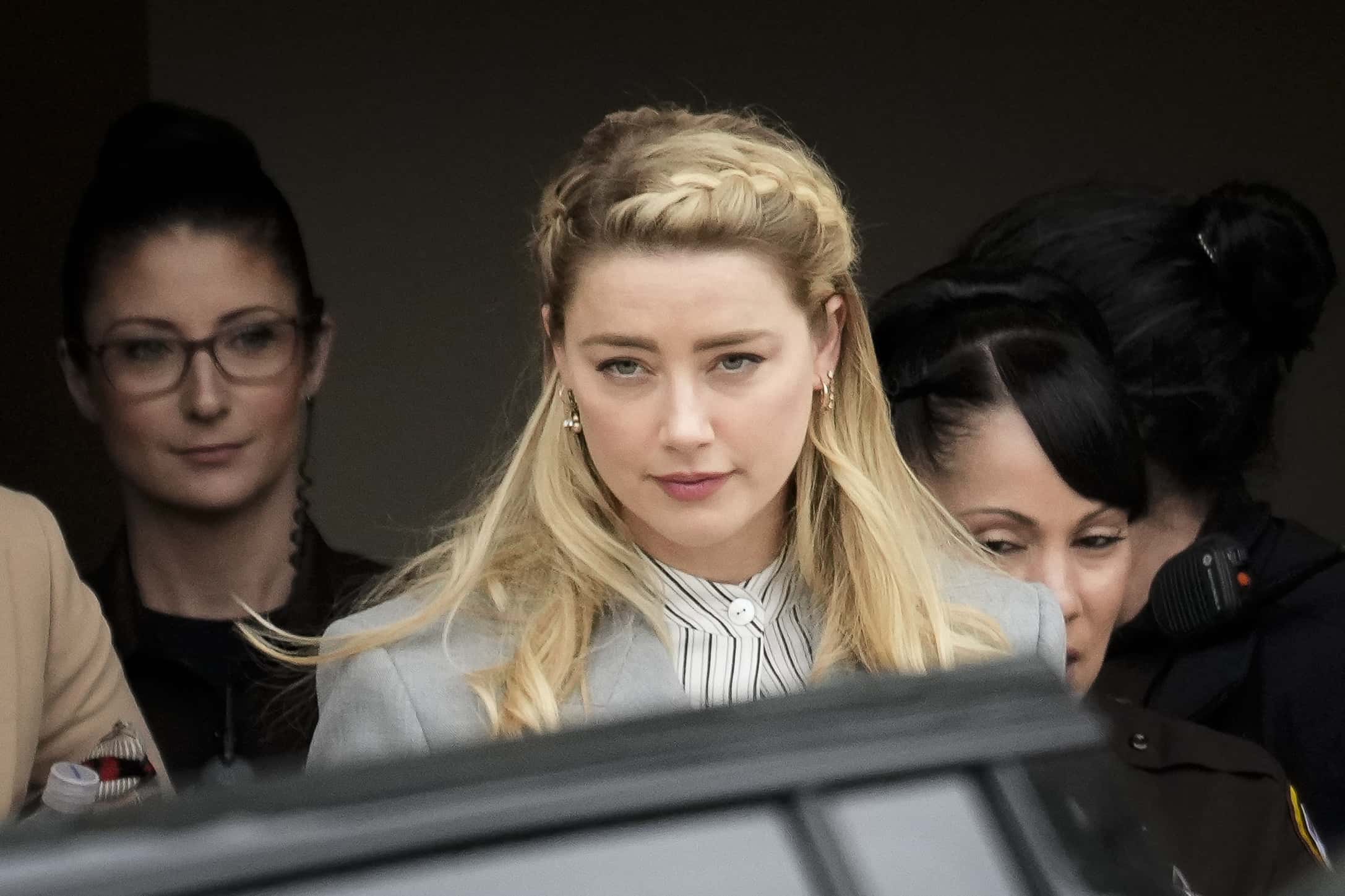 Actress Amber Heard departs the Fairfax County Courthouse on May 27, 2022 in Fairfax, Virginia. Closing arguments in the Depp v. Heard defamation trial, brought by Johnny Depp against his ex-wife Amber Heard, concluded today and jury deliberations begin.