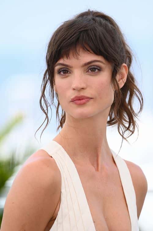 Charlbi Dean Kriek attends the photocall for