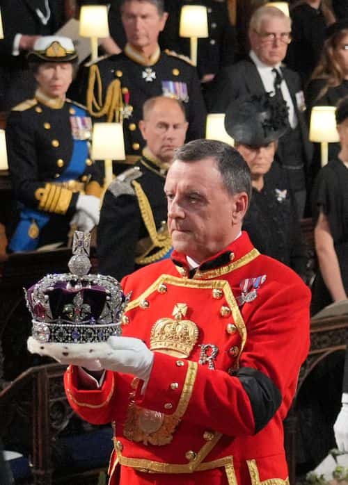 The Imperial State Crown is removed from the coffin at the Committal Service for Queen Elizabeth II, held at St George's Chapel in Windsor Castle on September 19, 2022 in Windsor, England. The committal service at St George's Chapel, Windsor Castle, took place following the state funeral at Westminster Abbey. A private burial in The King George VI Memorial Chapel followed. Queen Elizabeth II died at Balmoral Castle in Scotland on September 8, 2022, and is succeeded by her eldest son, King Charles III.
