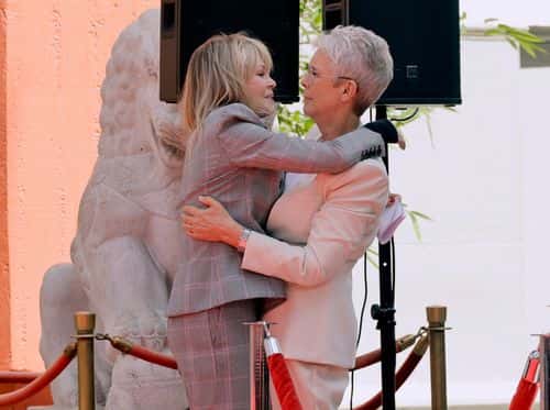 (L-R) Melanie Griffith and Jamie Lee Curtis attend the Jamie Lee Curtis Hand and Footprint In Cement Ceremony at TCL Chinese Theatre on October 12, 2022 in Hollywood, California.