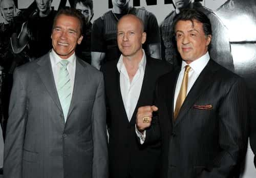 California Governor Arnold Schwarzenegger, actor Bruce Willis and director/writer/actor Sylvester Stallone arrive at the premiere of Lionsgate Films' 