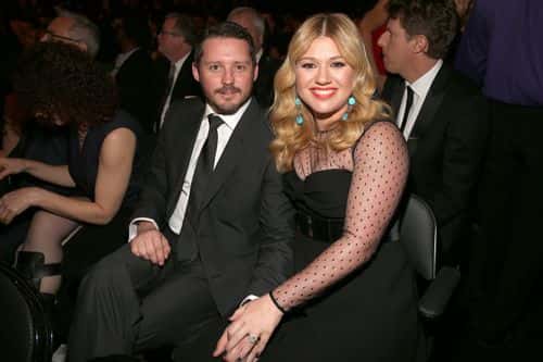 Singer Kelly Clarkson (R) and Brandon Blackstock attend the 55th Annual GRAMMY Awards at STAPLES Center on February 10, 2013 in Los Angeles, California.
