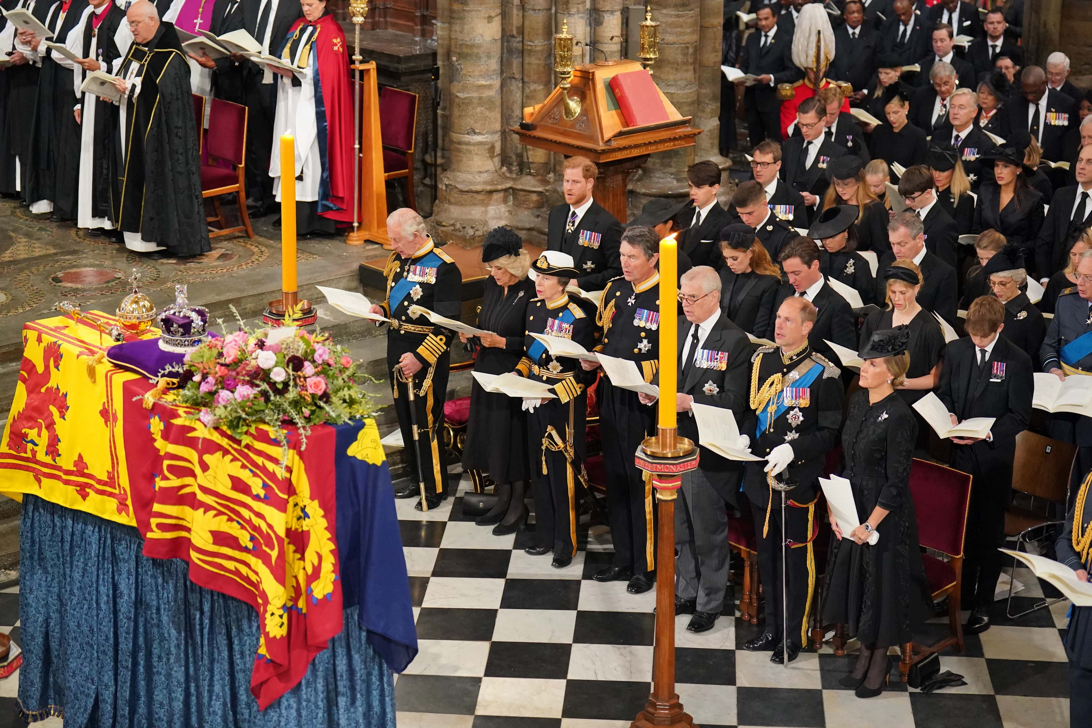 (front row) King Charles III, Camilla, Queen Consort, the Princess Royal, Vice Admiral Sir Tim Laurence, the Duke of York, the Earl of Wessex, the Countess of Wessex, (second row) the Duke of Sussex, the Duchess of Sussex, Princess Beatrice, Edoardo Mapelli Mozzi and Lady Louise Windsor, and (third row) Samuel Chatto, Arthur Chatto, Lady Sarah Chatto, Daniel Chatto in front of the coffin at the State Funeral of Queen Elizabeth II at Westminster Abbey on September 19, 2022 in London, England.  Elizabeth Alexandra Mary Windsor was born in Bruton Street, Mayfair, London on 21 April 1926. She married Prince Philip in 1947 and ascended the throne of the United Kingdom and Commonwealth on 6 February 1952 after the death of her Father, King George VI. Queen Elizabeth II died at Balmoral Castle in Scotland on September 8, 2022, and is succeeded by her eldest son, King Charles III.