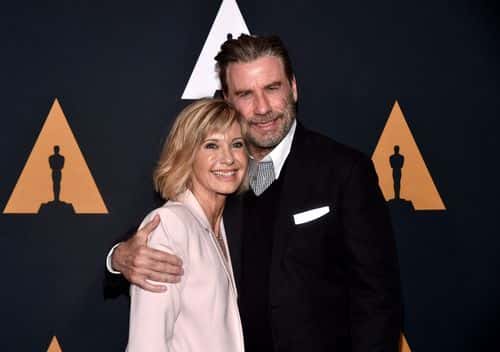 Olivia Newton-John (L) and John Travolta attend the