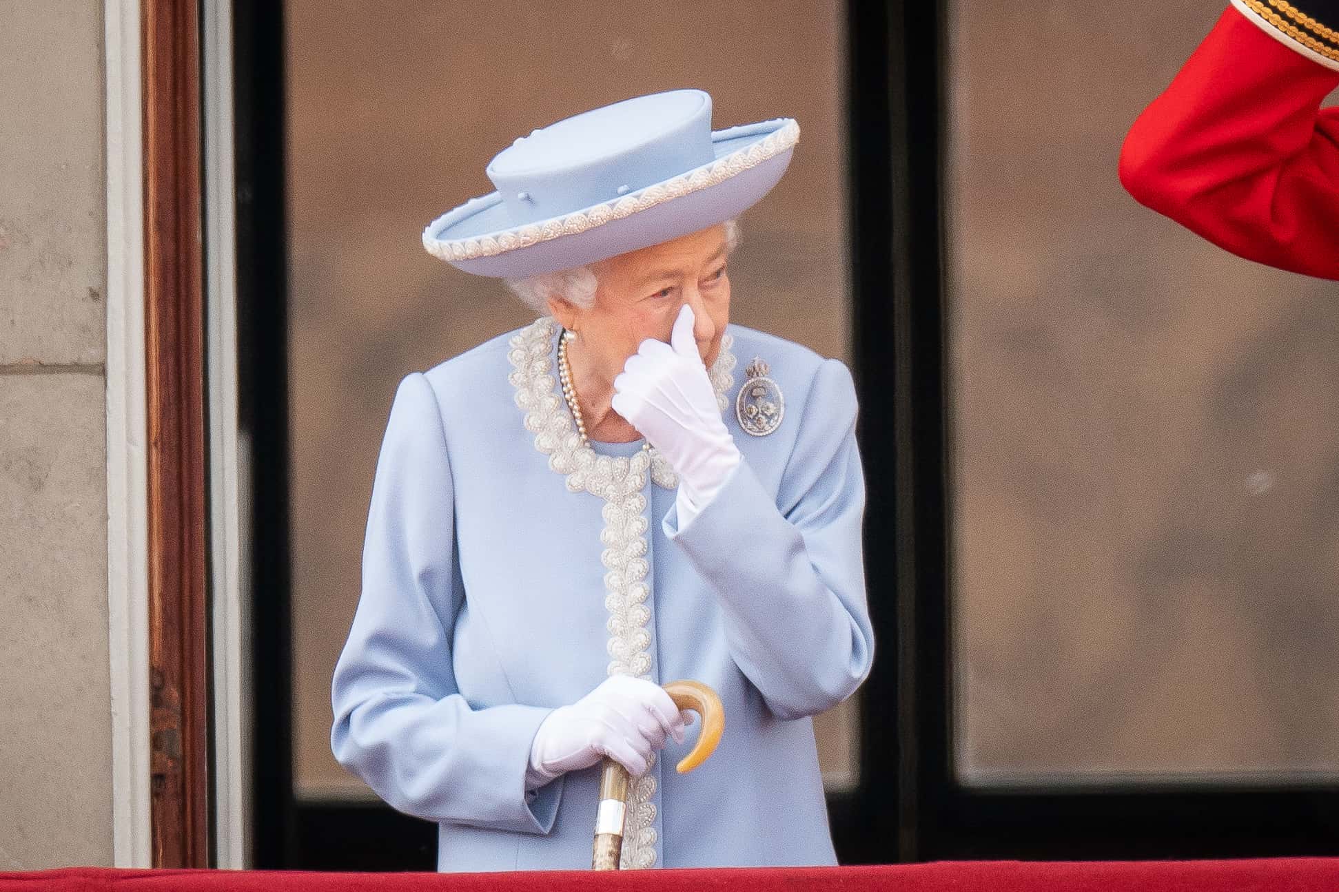 Queen Elizabeth II watches from the balcony at Buckingham Palace for the Trooping the Colour ceremony parade on June 2, 2022 in London, England. Trooping The Colour, also known as The Queen's Birthday Parade, is a military ceremony performed by regiments of the British Army that has taken place since the mid-17th century. It marks the official birthday of the British Sovereign. This year, from June 2 to June 5, 2022, there is the added celebration of the Platinum Jubilee of Elizabeth II  in the UK and Commonwealth to mark the 70th anniversary of her accession to the throne on 6 February 1952.