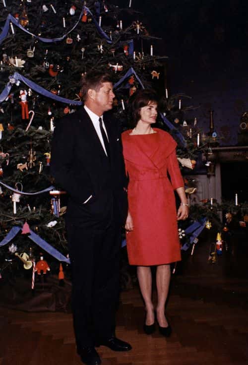 Jacqeuline Kennedy and her husband, President John F. Kenndy attend the White House staff Christmas Party, December 31, 1961 in Washington DC.
