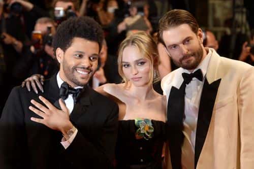 (L-R) Abel “The Weeknd” Tesfaye, Lily-Rose Depp and Sam Levinson attend the 