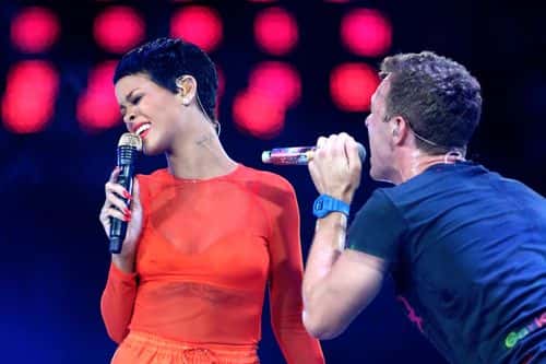Rihanna performs with Chris Martin of Coldplay during the closing ceremony on day 11 of the London 2012 Paralympic Games at Olympic Stadium on September 9, 2012 in London, England.