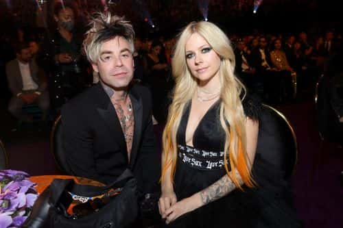 (L-R) Mod Sun and Avril Lavigne attend the 64th Annual GRAMMY Awards at MGM Grand Garden Arena on April 03, 2022 in Las Vegas, Nevada.