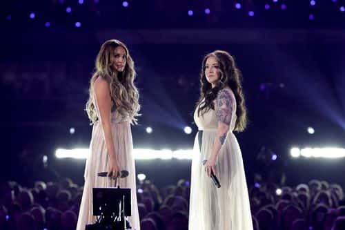 (L-R) Carly Pearce and Ashley McBryde perform onstage during the 57th Academy of Country Music Awards at Allegiant Stadium on March 07, 2022 in Las Vegas, Nevada.