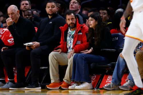 Adam Sandler and Sunny Sandler attend a game between the Atlanta Hawks and the Los Angeles Lakers in the first half at Crypto.com Arena on January 06, 2023 in Los Angeles, California.  NOTE TO USER: User expressly acknowledges and agrees that, by downloading and/or using this photograph, user is consenting to the terms and conditions of the Getty Images License Agreement.