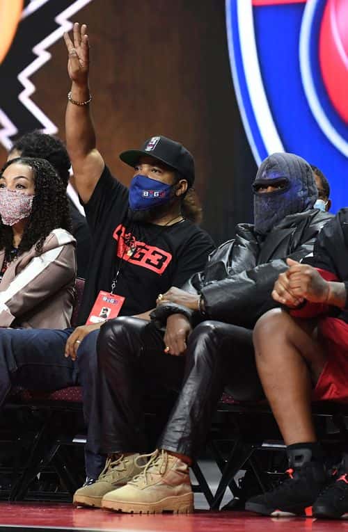 Ice Cube and Kanye West look on during a game between Killer 3's and 3's Company in the second week of the BIG3 at the Orleans Arena on July 17, 2021 in Las Vegas, Nevada.