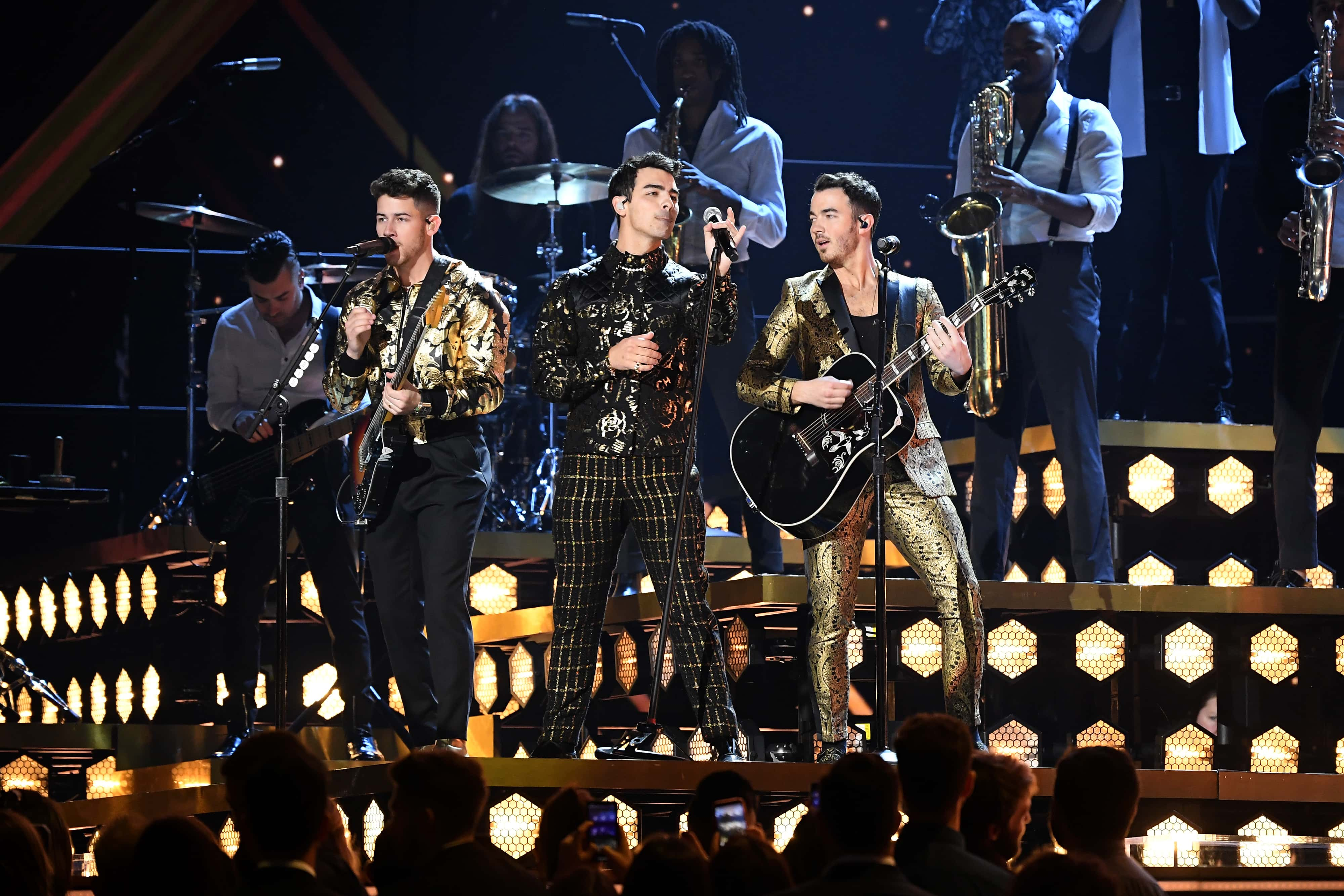 LOS ANGELES, CALIFORNIA - JANUARY 26: (L-R) Nick Jonas, Joe Jonas, and Kevin Jonas of Jonas Brothers