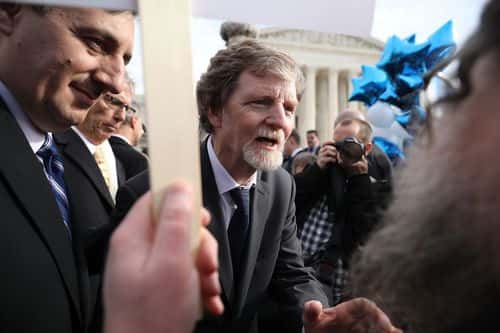 Conservative Christian baker Jack Phillips talks with supporters in front of the Supreme Court after the court heard the case Masterpiece Cakeshop v. Colorado Civil Rights Commission December 5, 2017 in Washington, DC. Siting his religious beliefs, Phillips refused to sell a gay couple a wedding cake for their same-sex ceremony in 2012, beginning a legal battle over freedom of speech and religion.