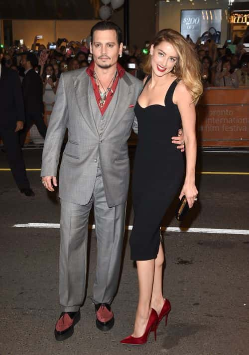 Actor Johnny Depp (L) and Actress Amber Heard attend the 'Black Mass' premiere during the 2015 Toronto International Film Festival at The Elgin on September 14, 2015 in Toronto, Canada.