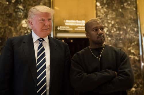 (L to R) President-elect Donald Trump and Kanye West stand together in the lobby at Trump Tower, December 13, 2016 in New York City. President-elect Donald Trump and his transition team are in the process of filling cabinet and other high level positions for the new administration.