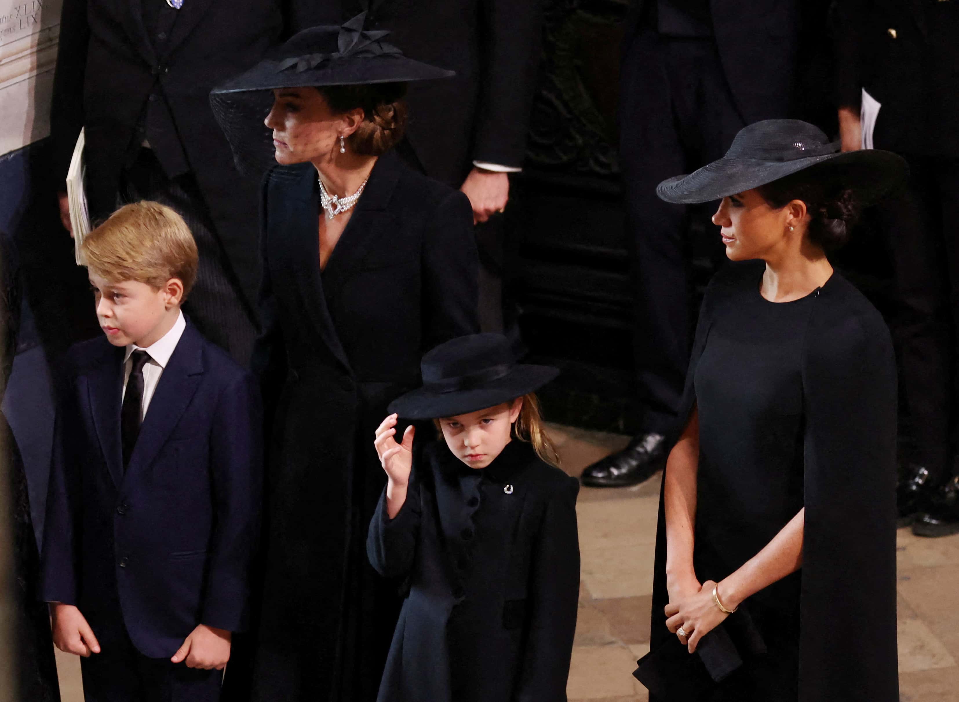 Catherine, Princess of Wales, Princess Charlotte of Wales, Prince George of Wales and Meghan, Duchess of Sussex arrive at Westminster Abbey for the State Funeral of Queen Elizabeth II on September 19, 2022 in London, England.  Elizabeth Alexandra Mary Windsor was born in Bruton Street, Mayfair, London on 21 April 1926. She married Prince Philip in 1947 and ascended the throne of the United Kingdom and Commonwealth on 6 February 1952 after the death of her Father, King George VI. Queen Elizabeth II died at Balmoral Castle in Scotland on September 8, 2022, and is succeeded by her eldest son, King Charles III.