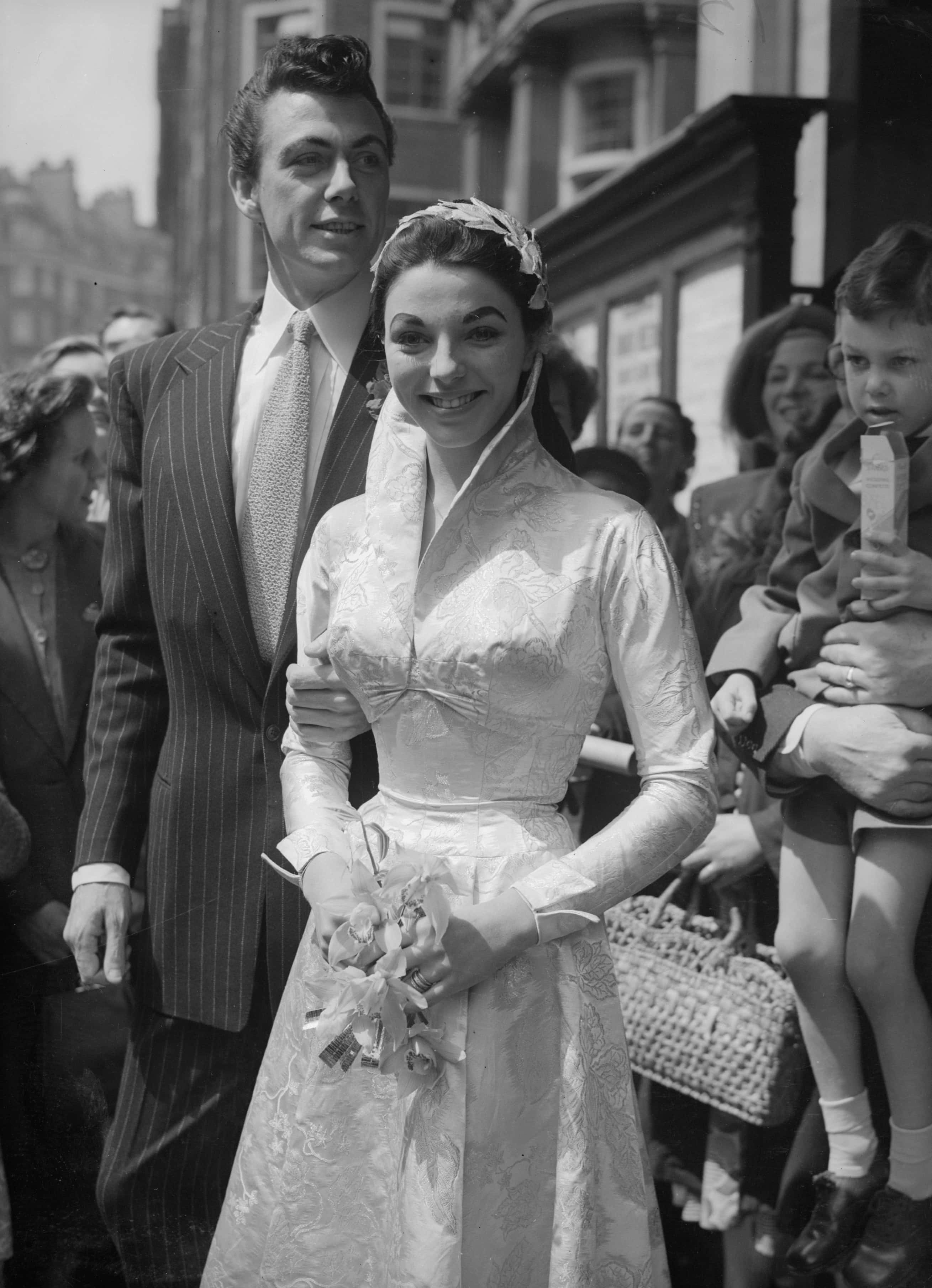 Film starlet Joan Collins marries actor Maxwell Reed (1919 - 1974).