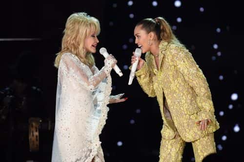 Dolly Parton (L) and Miley Cyrus perform onstage during the 61st Annual GRAMMY Awards at Staples Center on February 10, 2019 in Los Angeles, California.