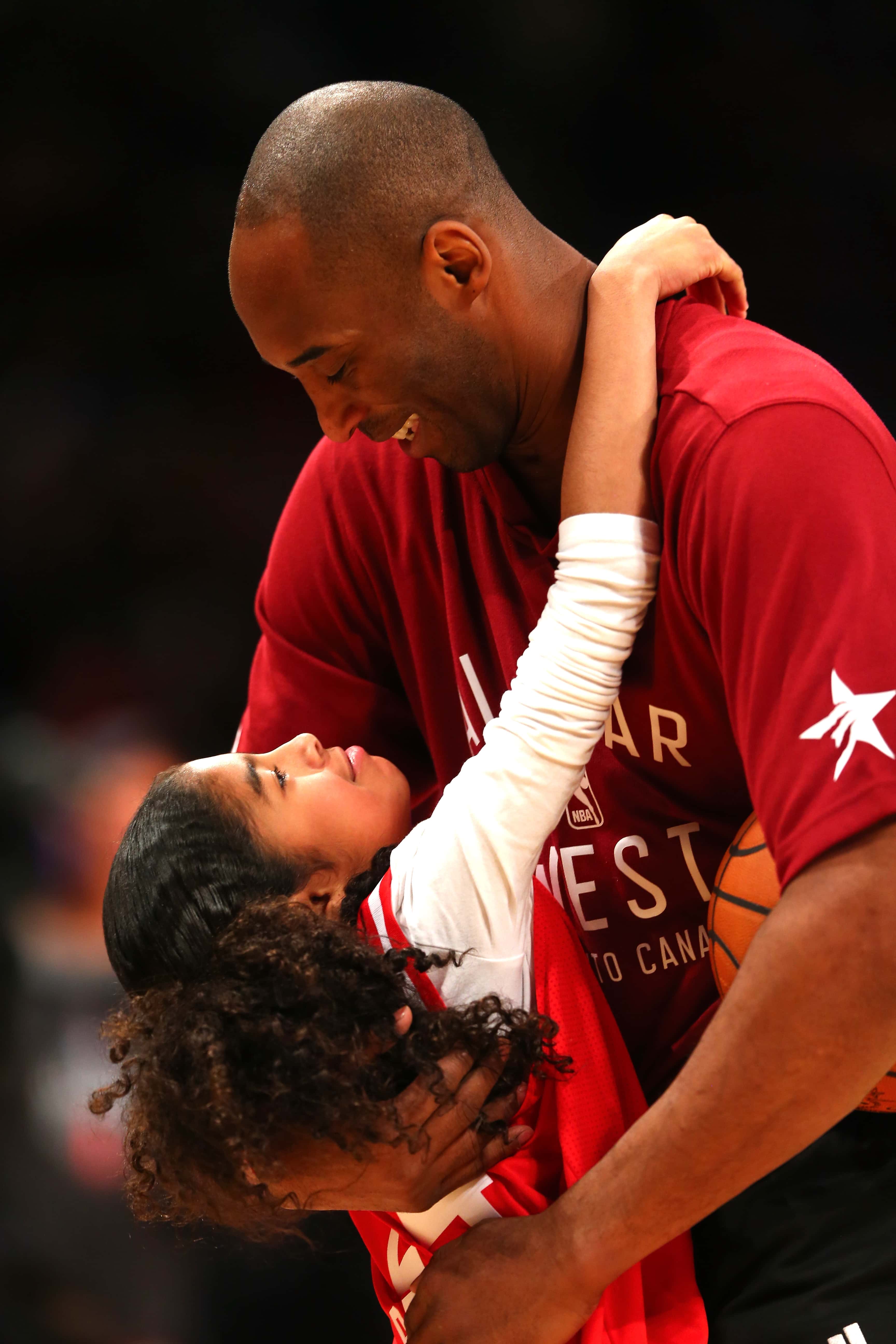 Kobe Bryant #24 of the Los Angeles Lakers and the Western Conference warms up with daughter Gianna Bryant during the NBA All-Star Game 2016 at the Air Canada Centre on February 14, 2016 in Toronto, Ontario. NOTE TO USER: User expressly acknowledges and agrees that, by downloading and/or using this Photograph, user is consenting to the terms and conditions of the Getty Images License Agreement.