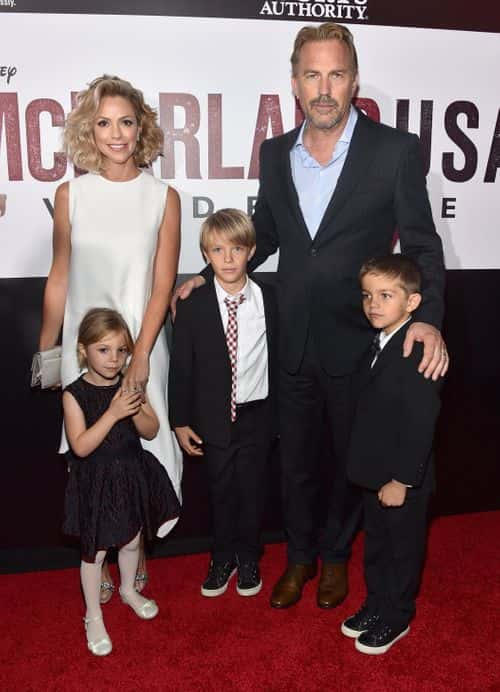 Actor Kevin Costner (R) and Christine Baumgartner with their children attend the world premiere of 