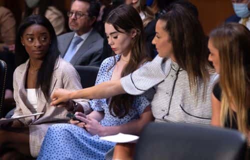 US gymnasts (L-R) Simone Biles, McKayla Maroney, Aly Raisman and Maggie Nichols arrive to testify during a Senate Judiciary hearing about the Inspector General's report on the FBI handling of the Larry Nassar investigation of sexual abuse of Olympic gymnasts, on Capitol Hill, September 15, 2021, in Washington, DC.