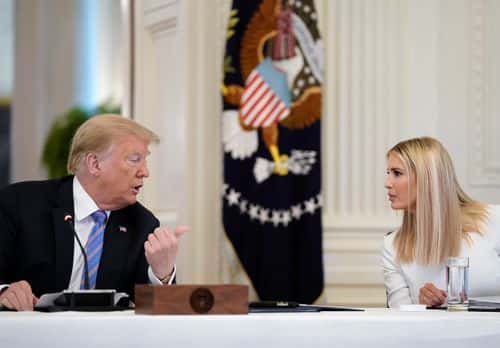 U.S. President Donald Trump talks with White House advisor Ivanka Trump during a meeting of the American Workforce Policy Advisory Board in the East Room of the White House on June 26, 2020 in Washington, DC. Earlier in the day President Trump canceled his scheduled weekend trip to his private golf club in Bedminster, New Jersey which the state now has a mandatory 14-day quarantine for travelers coming from states with coronavirus spikes.