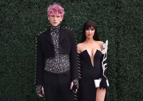 (L-R) Machine Gun Kelly and Megan Fox attend the 2022 Billboard Music Awards at MGM Grand Garden Arena on May 15, 2022 in Las Vegas, Nevada.