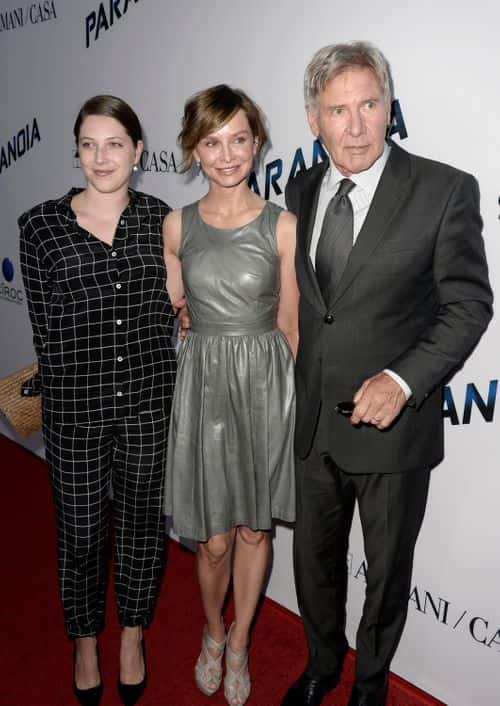 Actors Calista Flockhart (C), Harrison Ford (R) and daughter Georgia (L) attend the premiere of Relativity Media's
