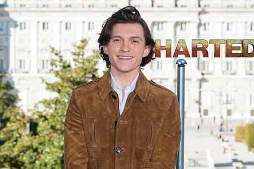 Actor Tom Holland attends  'Uncharted' photocall at the Royal Theater on February 08, 2022 in Madrid, Spain.