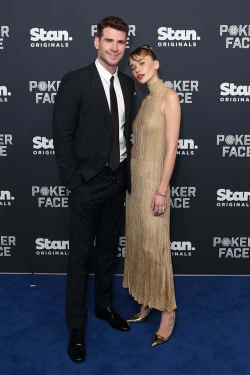 Liam Hemsworth (L) and Gabriella Brooks attend the Australian Premiere of Poker Face at Hoyts Entertainment Quarter on November 15, 2022 in Sydney, Australia.