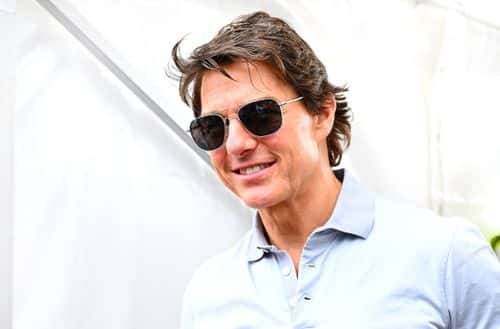 Actor Tom Cruise walks in the Paddock prior to the F1 Grand Prix of Great Britain at Silverstone on July 03, 2022 in Northampton, England.