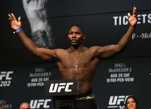 Mixed martial artist Anthony Johnson poses on the scale during his weigh-in for UFC 202 at MGM Grand Conference Center on August 19, 2016 in Las Vegas, Nevada. Johnson will meet Glover Teixeira in a light heavyweight bout on August 20, 2016, at T-Mobile Arena in Las Vegas.