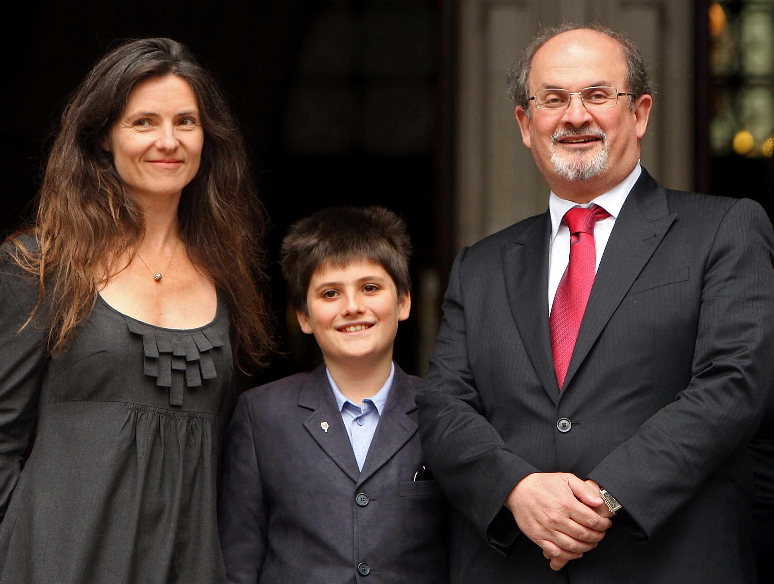 Indian-British novelist Salman Rushdie leaves the High Court with former wife Elizabeth West and their son Milan Rushdie on August 26, 2008 in London, England. Salman Rushdie received an apology from former police officer Ron Evans, Evans' ghost writer and John Blake Publishing Ltd over alegations against himself and his ex-wife in the memiors of his former Special Branch bodyguard.