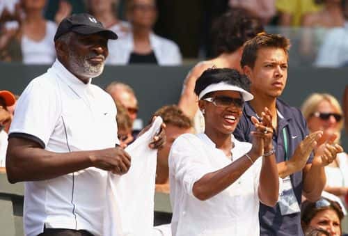 Richard Williams and Lakeisha Graham applaud as Serena Williams of USA competes during the women's singles semi final match against Elena Dementieva of Russia on Day Ten of the Wimbledon Lawn Tennis Championships at the All England Lawn Tennis and Croquet Club on July 2, 2009 in London, England.