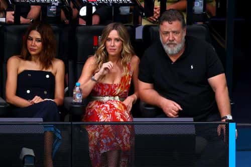 Russell Crowe and Britney Theriot look on before the Women’s Singles Final match between Elena Rybakina of Kazakhstan and Aryna Sabalenka during day 13 of the 2023 Australian Open at Melbourne Park on January 28, 2023 in Melbourne, Australia.