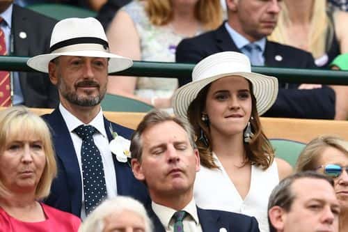 John Vosler and Emma Watson attend day twelve of the Wimbledon Lawn Tennis Championships at All England Lawn Tennis and Croquet Club on July 14, 2018 in London, England.