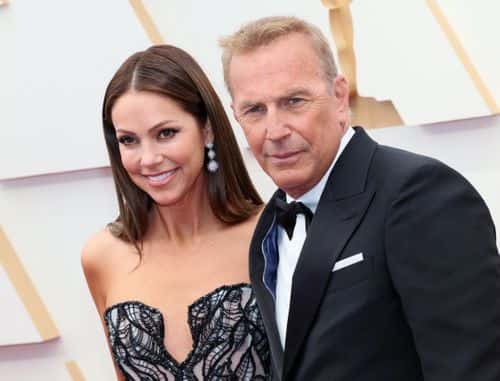 Christine Baumgartner and Kevin Costner attend the 94th Annual Academy Awards at Hollywood and Highland on March 27, 2022 in Hollywood, California.
