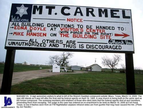 A sign welcomes visitors to what is left of the Branch Davidian compound outside Waco, Texas, March 14, 2000. The sign still stands as it was left after the final raid by federal agents on April 19, 1993. A new church is being built on the same spot as the former compound. The surviving members and relatives of those who died claim that the federal agents shot at sect members, preventing them from escaping. The judge in the case has ordered an re-enactment to be held on March 19, 2000 at Fort Hood, Texas, to see if flashes seen from an FBI Nightstalker airplane infrared video are from gunfire that may have caused the fire.