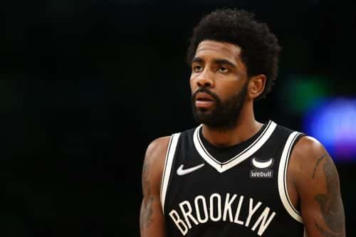 Kyrie Irving #11 of the Brooklyn Nets looks on during the second quarter of Game Two of the Eastern Conference First Round NBA Playoffs against the Boston Celtics at TD Garden on April 20, 2022 in Boston, Massachusetts.