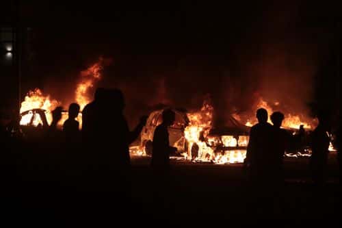 Fires burn around downtown during a second night of rioting on August 24, 2020 in Kenosha, Wisconsin. Rioting as well as clashes between police and protesters began Sunday night after a police officer shot Jacob Blake 7 times in the back in front of his three children.