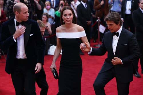 Prince William, Duke of Cambridge and Catherine, Duchess of Cambridge are accompanied by star actor Tom Cruise as they arrive for the