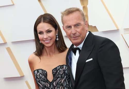 (L-R) Christine Baumgartner and Kevin Costner attend the 94th Annual Academy Awards at Hollywood and Highland on March 27, 2022 in Hollywood, California.