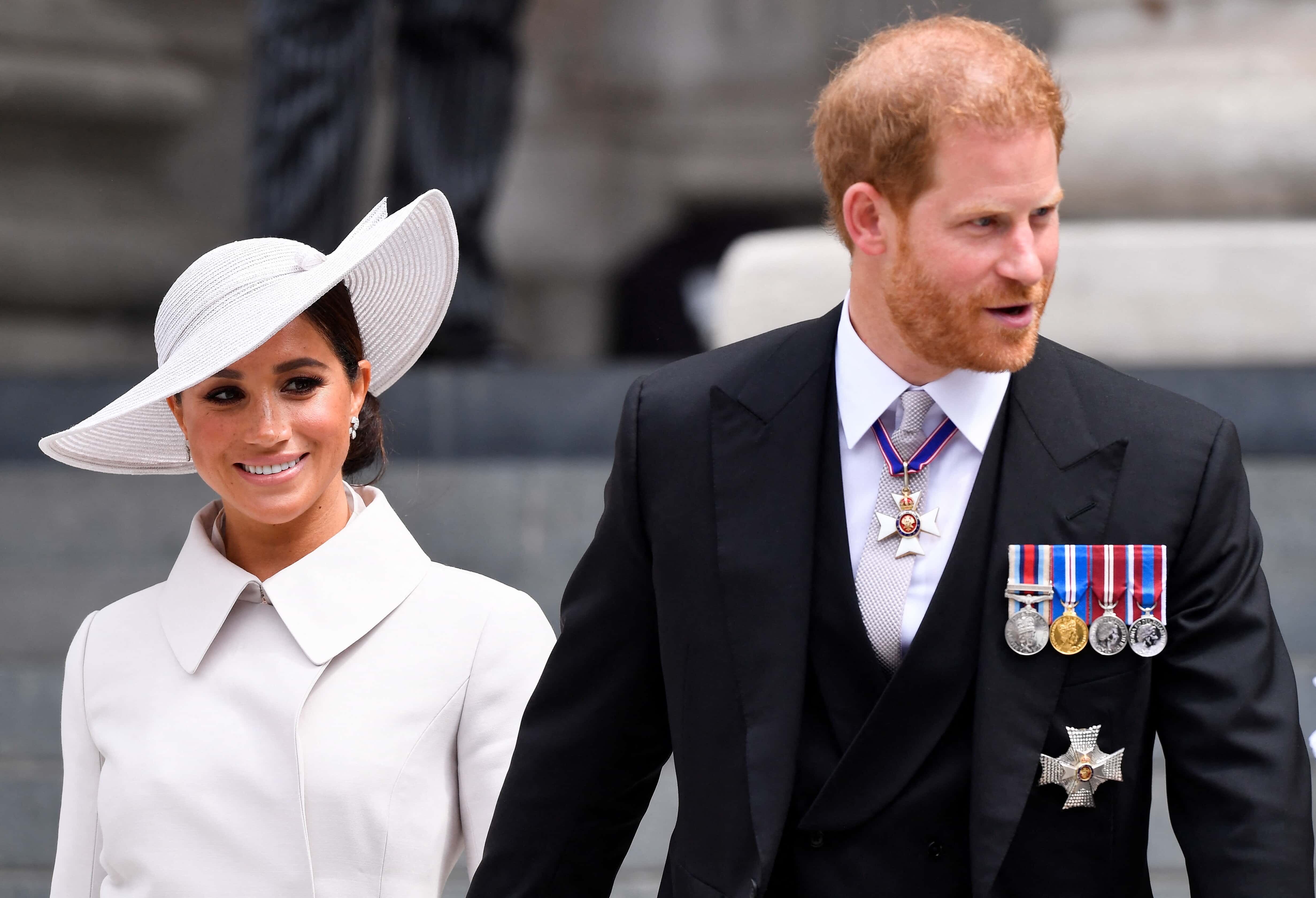 Prince Harry, Duke of Sussex, and Meghan, Duchess of Sussex after attending the National Service of Thanksgiving at St Paul's Cathedral during the Queen's Platinum Jubilee celebrations on June 3, 2022 in London, England. The Platinum Jubilee of Elizabeth II is being celebrated from June 2 to June 5, 2022, in the UK and Commonwealth to mark the 70th anniversary of the accession of Queen Elizabeth II on 6 February 1952.