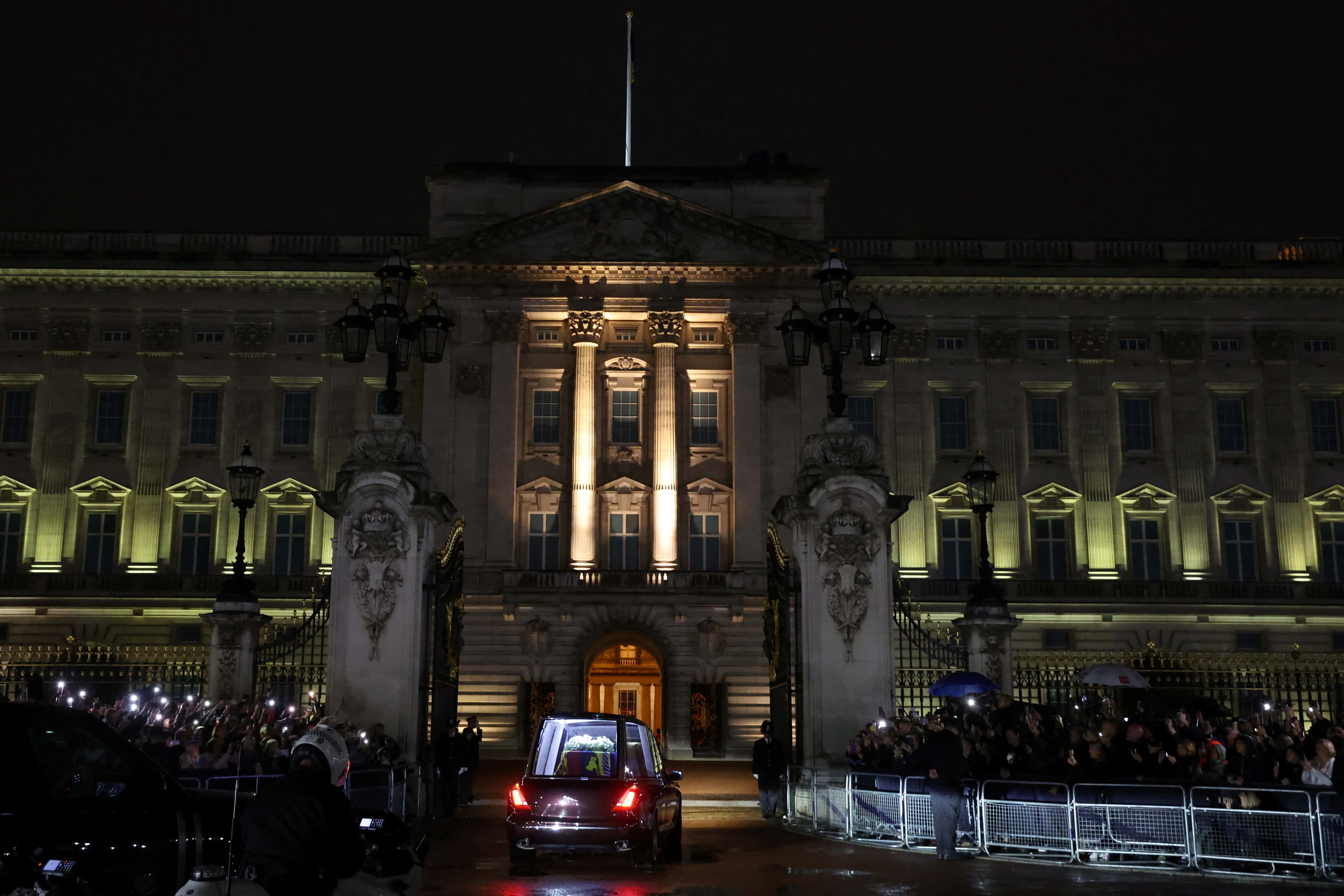 The Royal Hearse carrying the coffin of Queen Elizabeth II arrives at Buckingham Palace on September 13, 2022 in London, England. The coffin carrying Her Majesty Queen Elizabeth II leaves St Giles Church travelling to Edinburgh Airport where it will be flown to London and transferred to Buckingham Palace by road. Queen Elizabeth II died at Balmoral Castle in Scotland on September 8, 2022, and is succeeded by her eldest son, King Charles III.