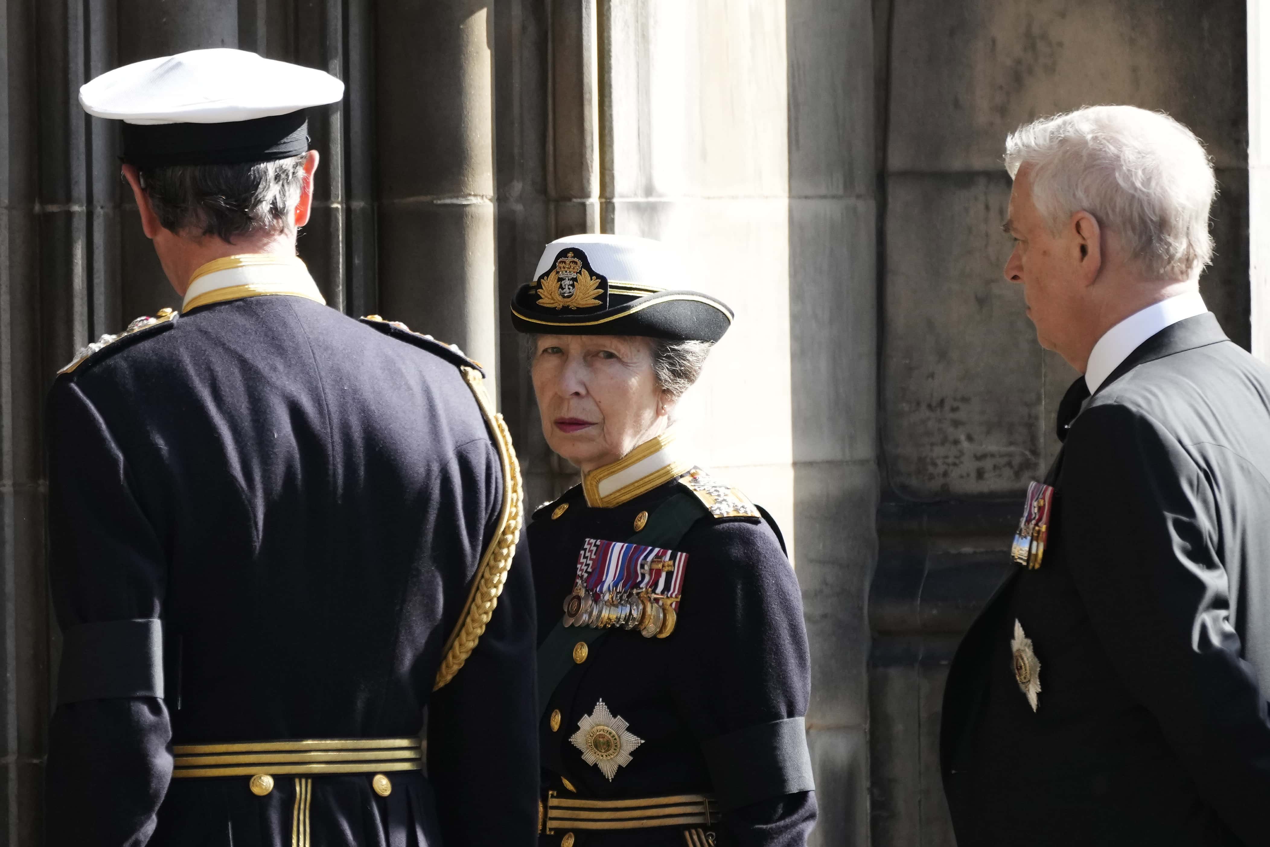 Princess Anne, Princess Royal (C) and Prince Andrew, Duke of York (R) arrive with Queen Elizabeth II’s funeral cortege as it made its way along The Royal Mile to St Giles Cathedral on September 12, 2022 in Edinburgh, Scotland. King Charles III joins the procession accompanying Her Majesty The Queen's coffin from the Palace of Holyroodhouse along the Royal Mile to St Giles Cathedral. The King and The Queen Consort, accompanied by other Members of the Royal Family also attend a Service of Prayer and Reflection for the Life of The Queen where it lies in rest for 24 hours before being transferred by air to London.