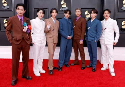(L-R) V, Suga, Jin, Jungkook, RM, Jimin and J-Hope of BTS attend the 64th Annual GRAMMY Awards at MGM Grand Garden Arena on April 03, 2022 in Las Vegas, Nevada.