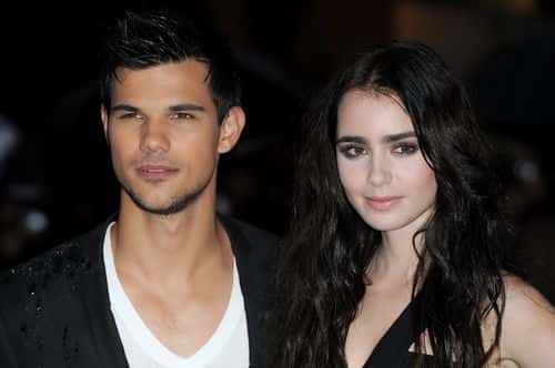 (L-R) Taylor Lautner and Lily Collins attend the UK Film Premiere of Abduction at BFI IMAX on September 26, 2011 in London, England.